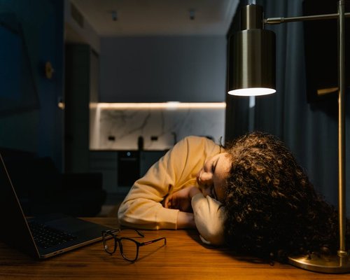A person resting away from screens in the evening